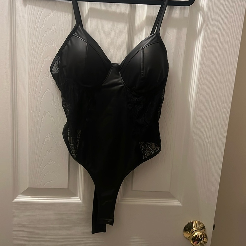 Black leather and lace body suit